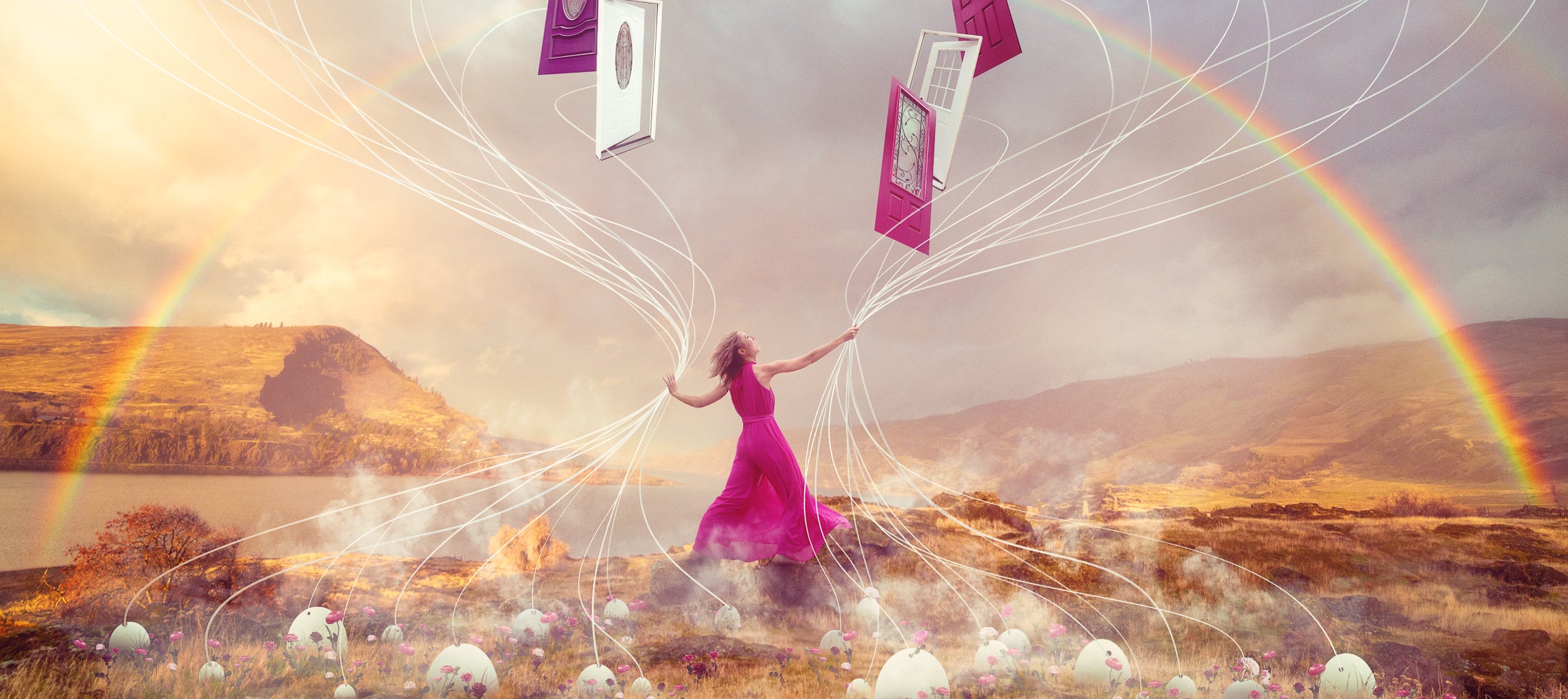 Turning Dreams into Doors image Fightsong Studio Woman in Pink Dress arms raised to sky